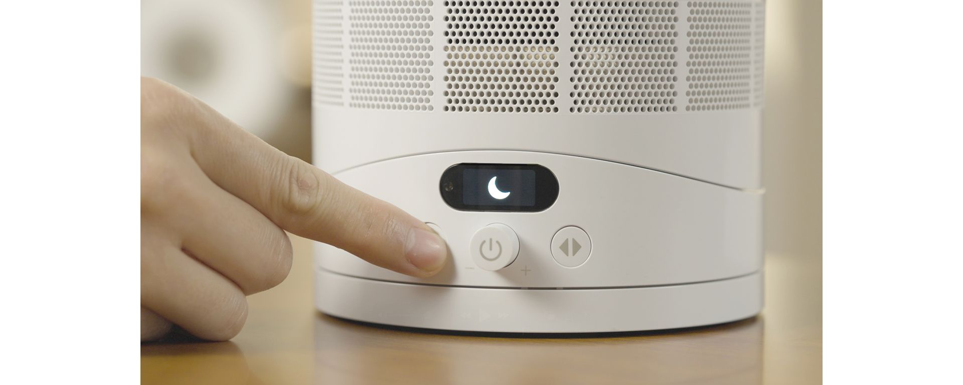 Sleep mode is activated on the Dyson Cool CF1 fan using the button on the base of the fan.