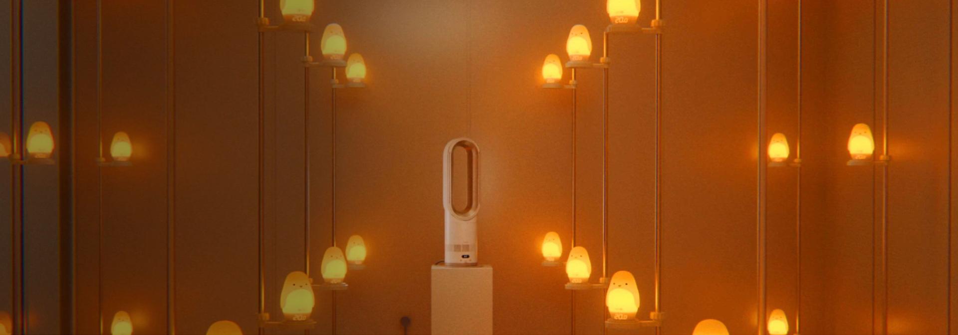 The Dyson Hot+Cool HF1 Remote Link Pre-heat heater and cooling fan heats a large testing room in a Dyson lab.