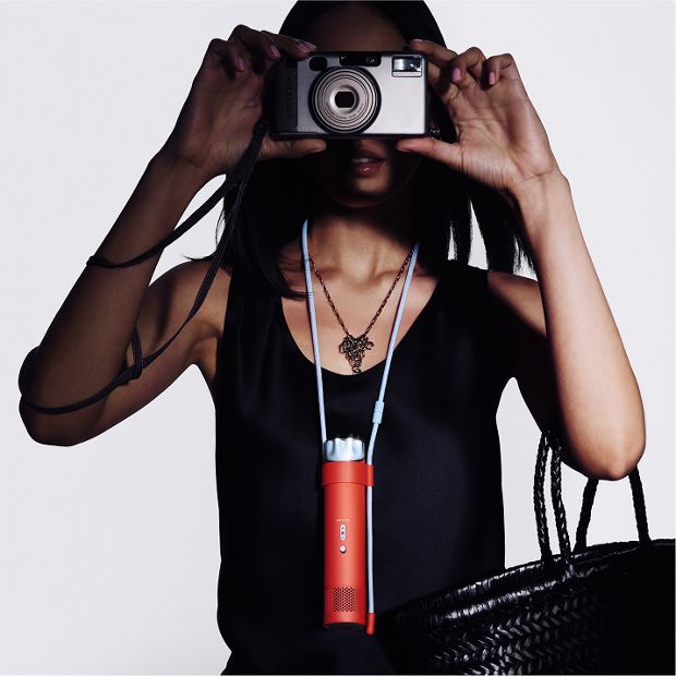 The Dyson HushJet Mini Cool portable fan placed in the Neck Dock.