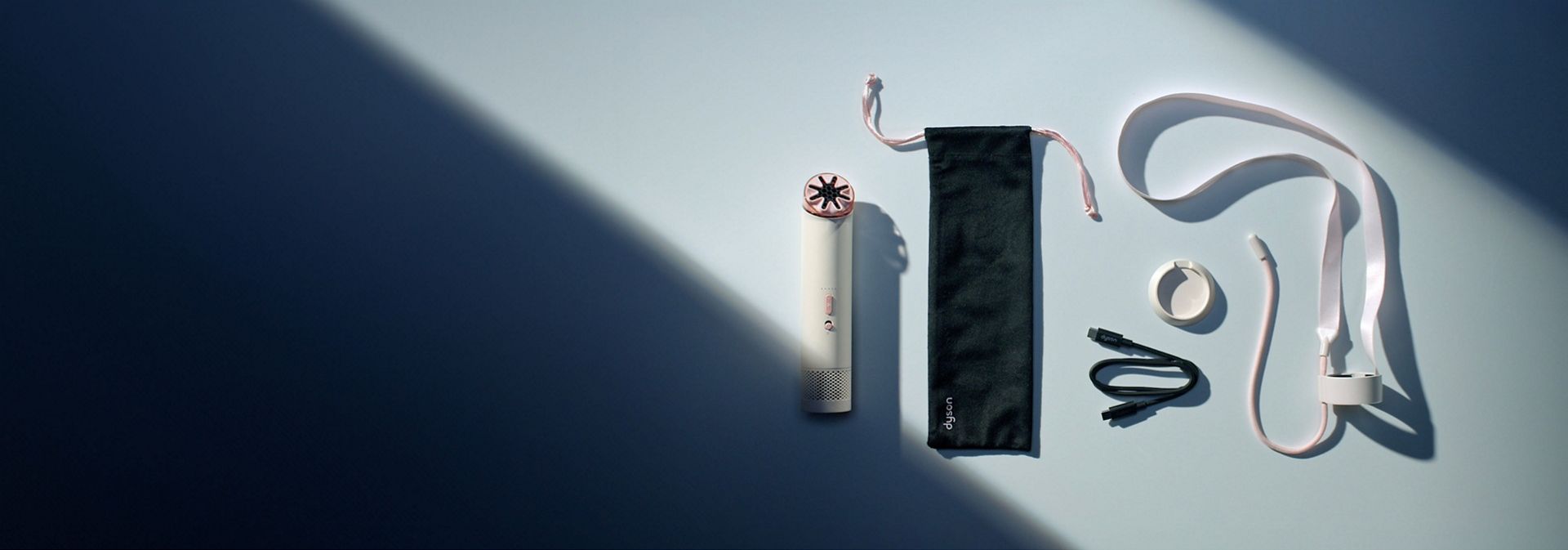 Dyson HushJet Mini Cool fan with the included accessories.