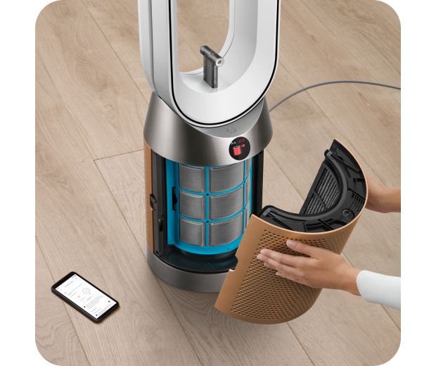 A filter is replaced on the Dyson Find+Follow Purifier Cool fan.