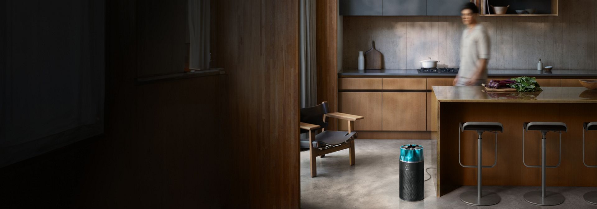 The Dyson HushJet Compact Purifier next to a kitchen island.