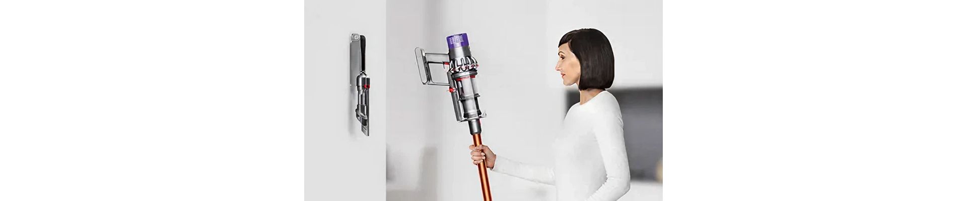 Usisavač Dyson Cyclone V10 vraća se na svoju zidnu stanicu.