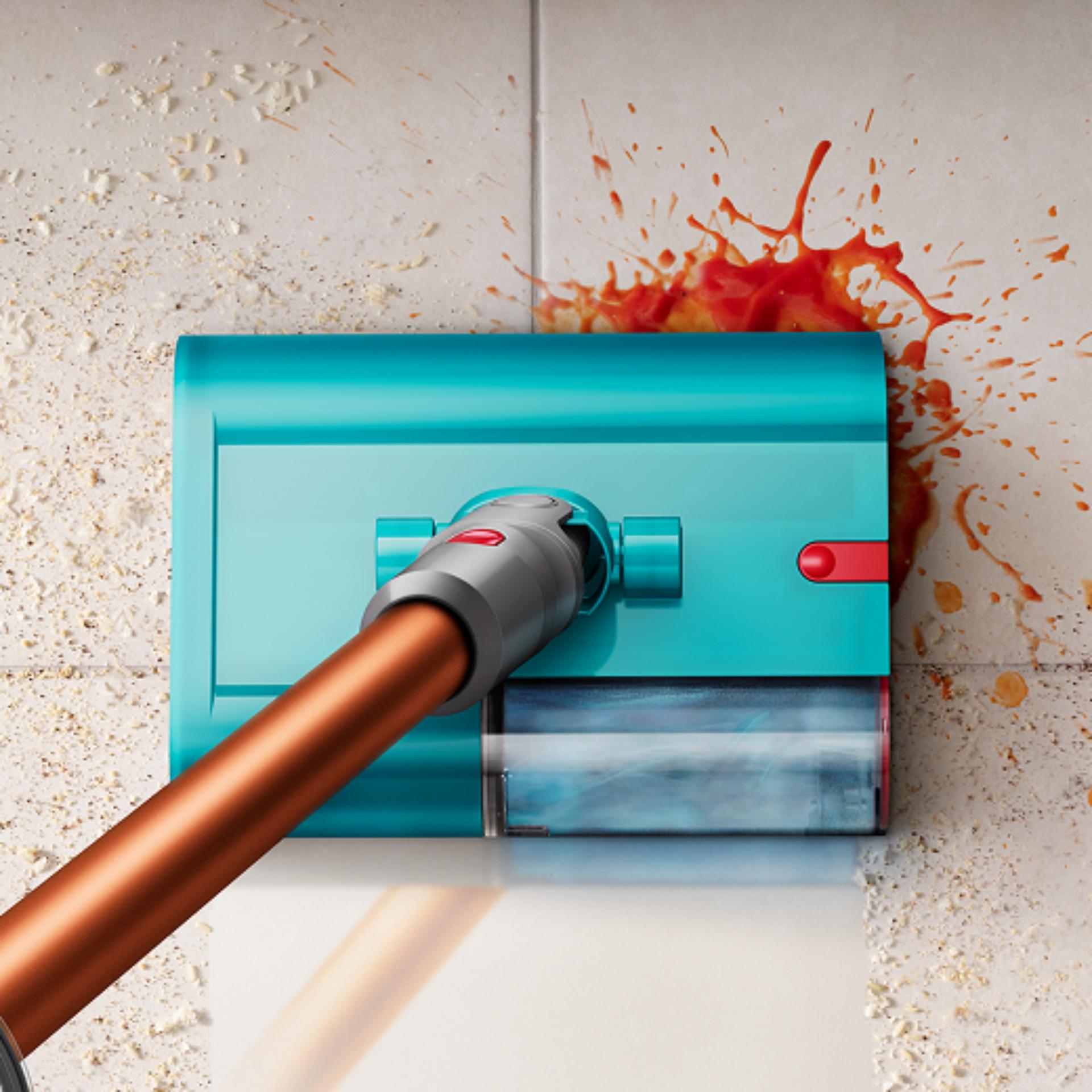 Podlahová hubice Submarine pro vytírání používaná k úklidu rozlité tekutiny v kuchyni.