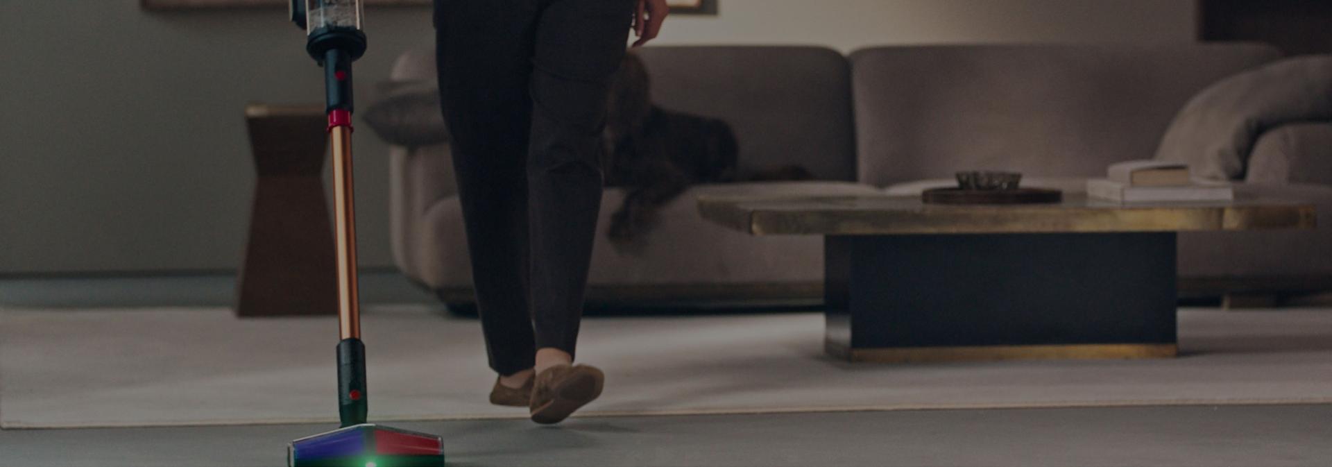 Dyson vacuum motorhead attachment cleaning hard floor then carpet.