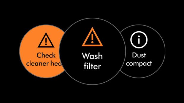 The LCD screen of the Dyson DS60 Piston Animal vacuum shows various maintenance alerts.
