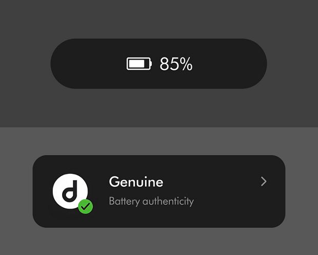 Battery life indicator and a Dyson Genuine Battery authenticity mark.