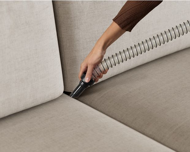 The Flexi hose tool is used to more easily clean between sofa cushions.