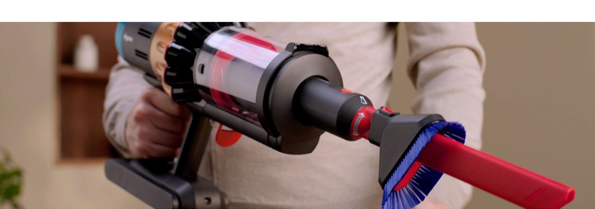 The Awkward gap tool 2.0 is attached to the Dyson DS60 Piston Animal vacuum.