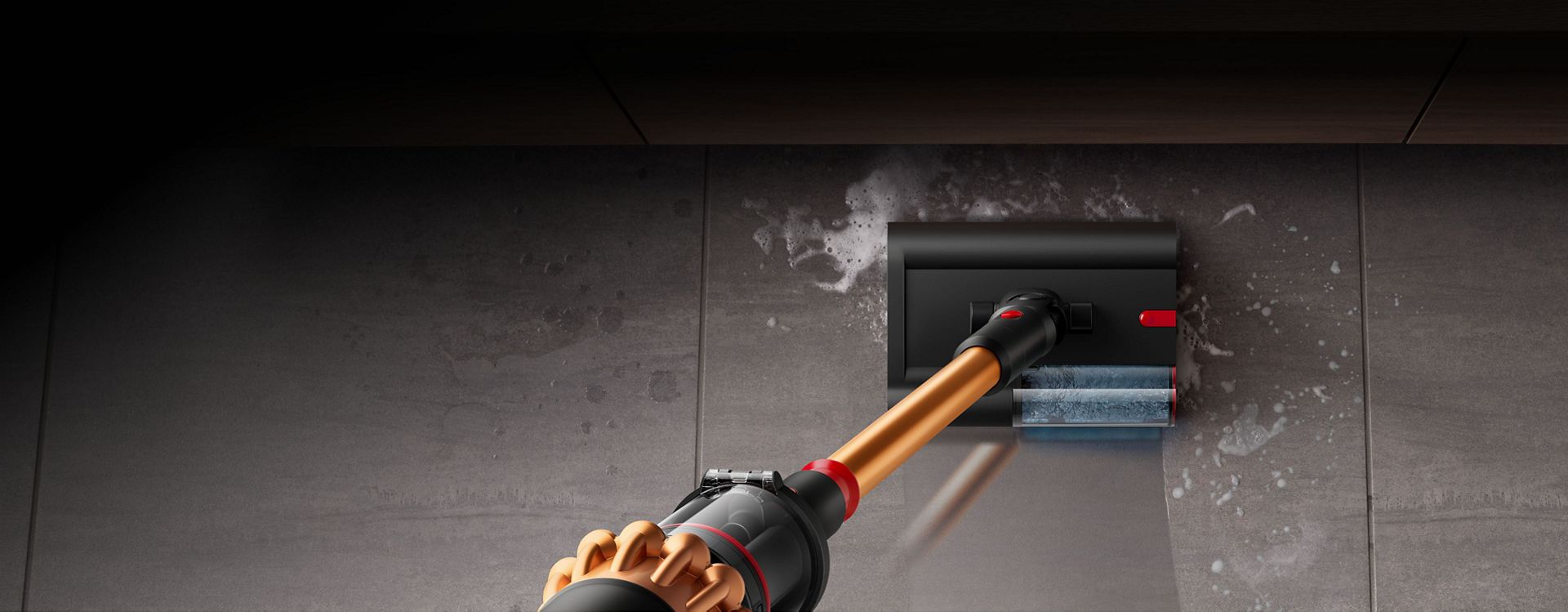 The Dyson Piston Submarine 2.0 wet cleaner head cleaning up spills.