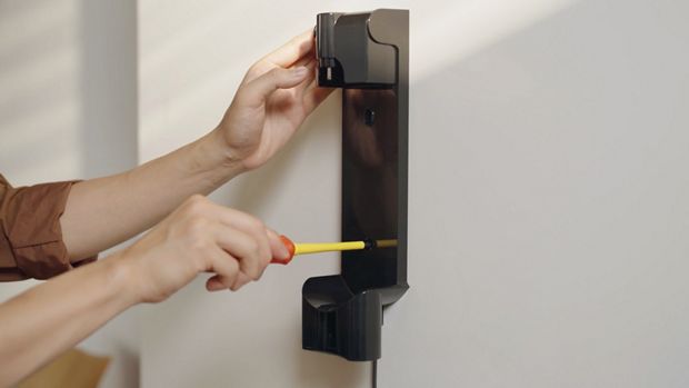 The Wall Dok is screwed into place on a wall.