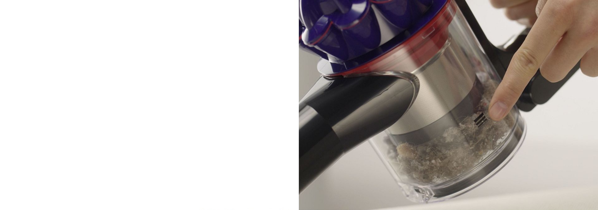 Dyson V10 vacuum is emptied into a bin.