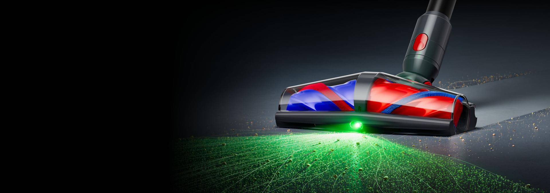 Dyson De-tangling conical head illuminates dust and dirt on hard floors.