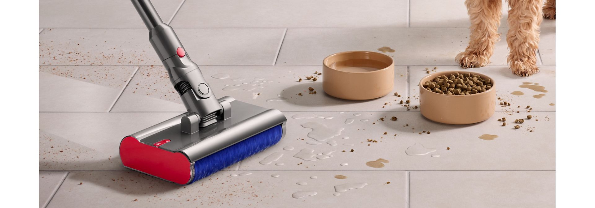 Dyson Submarine cleaner head used to clean spills from a tiled floor.