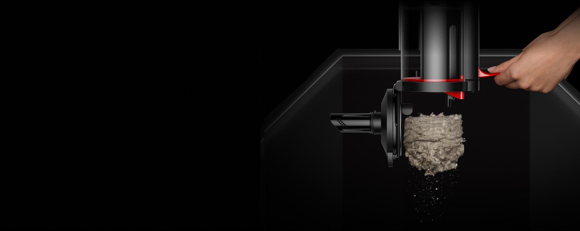 Dyson CleanCompaktor bin is emptied with a single smooth motion.
