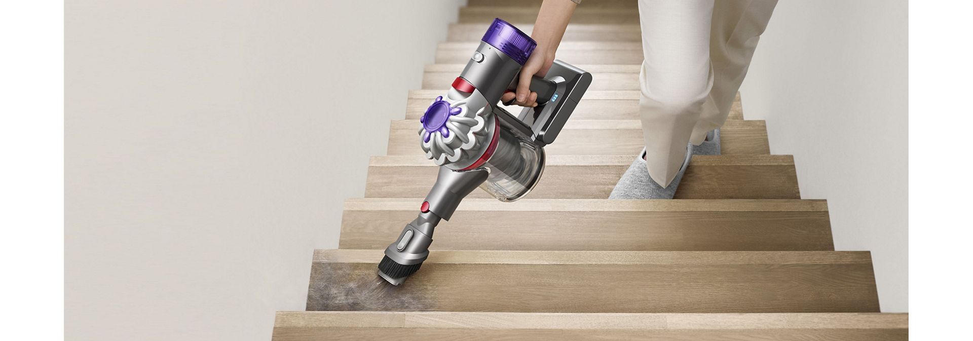 Dyson V8 Focus Clean handheld vacuum used to clean stairs.