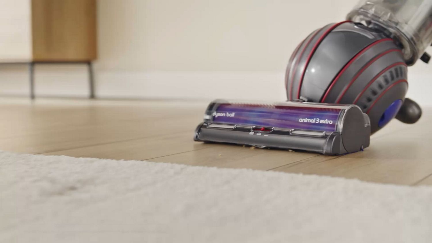 A Dyson Big Ball Animal 3 Extra cleaning a hard surface.