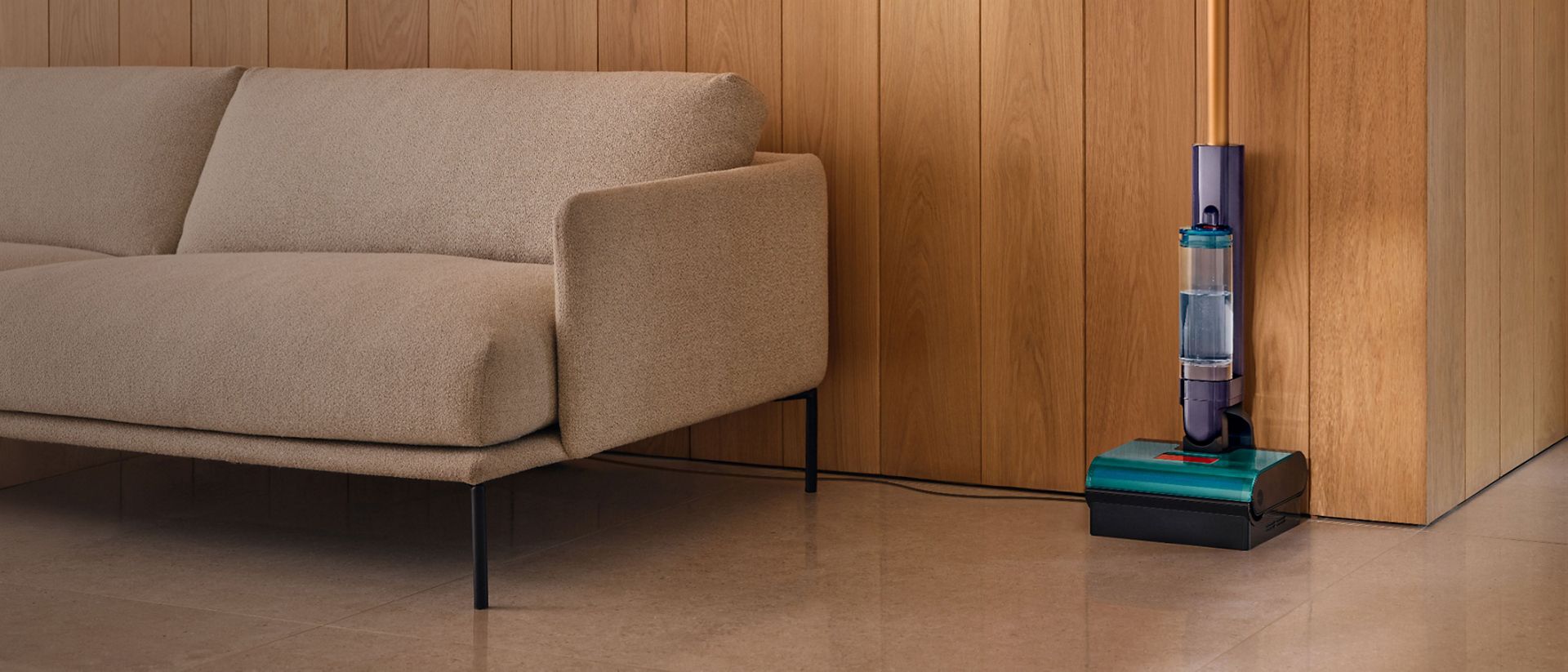 The Dyson Clean+Wash Hygiene hard floor cleaner in a room with freshly cleaned hard floors.