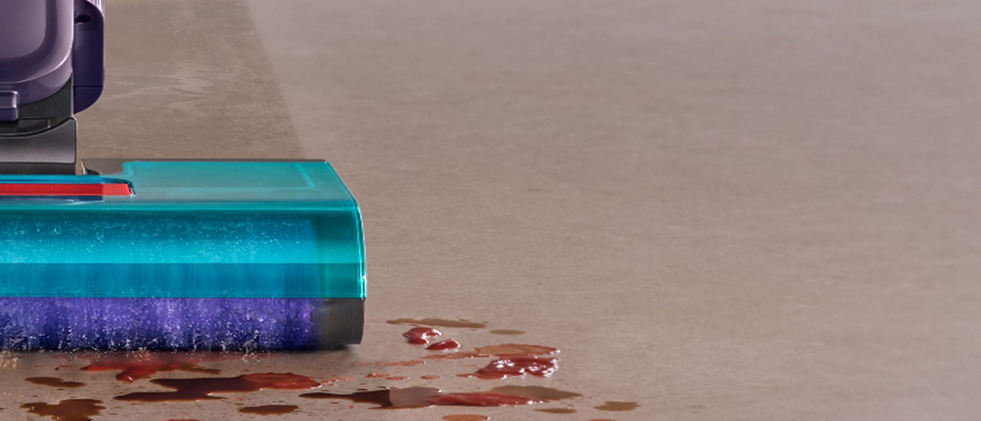 The Dyson Clean+Wash Hygiene hard floor cleaner washing wet spills from the floor.