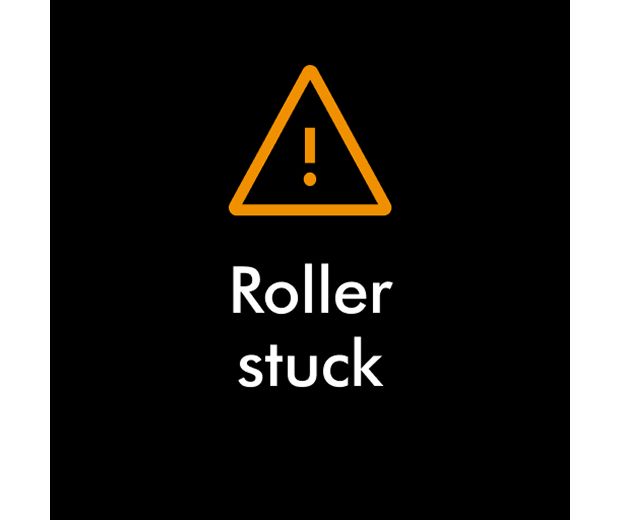 Výstražná ikona s textem: Zaseknutý rotační kartáč.