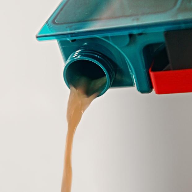 Cutaway showing automatic waste separation in the cleaner head of the Dyson Clean+Wash Hygiene hard floor cleaner.