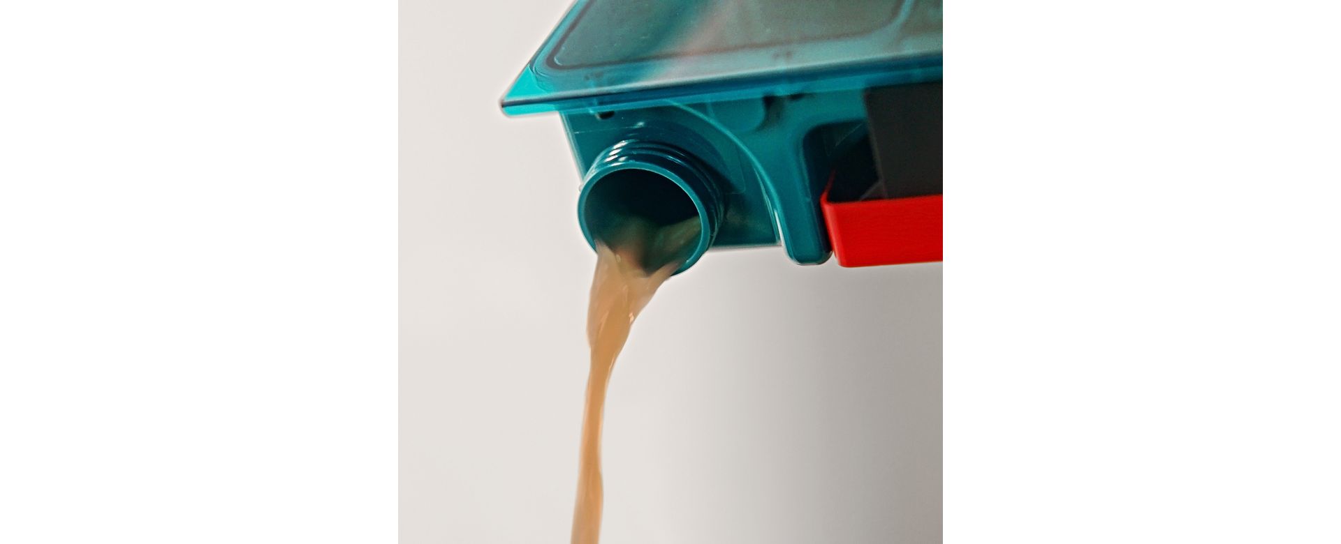 Cutaway showing automatic waste separation in the cleaner head of the Dyson Clean+Wash Hygiene hard floor cleaner.