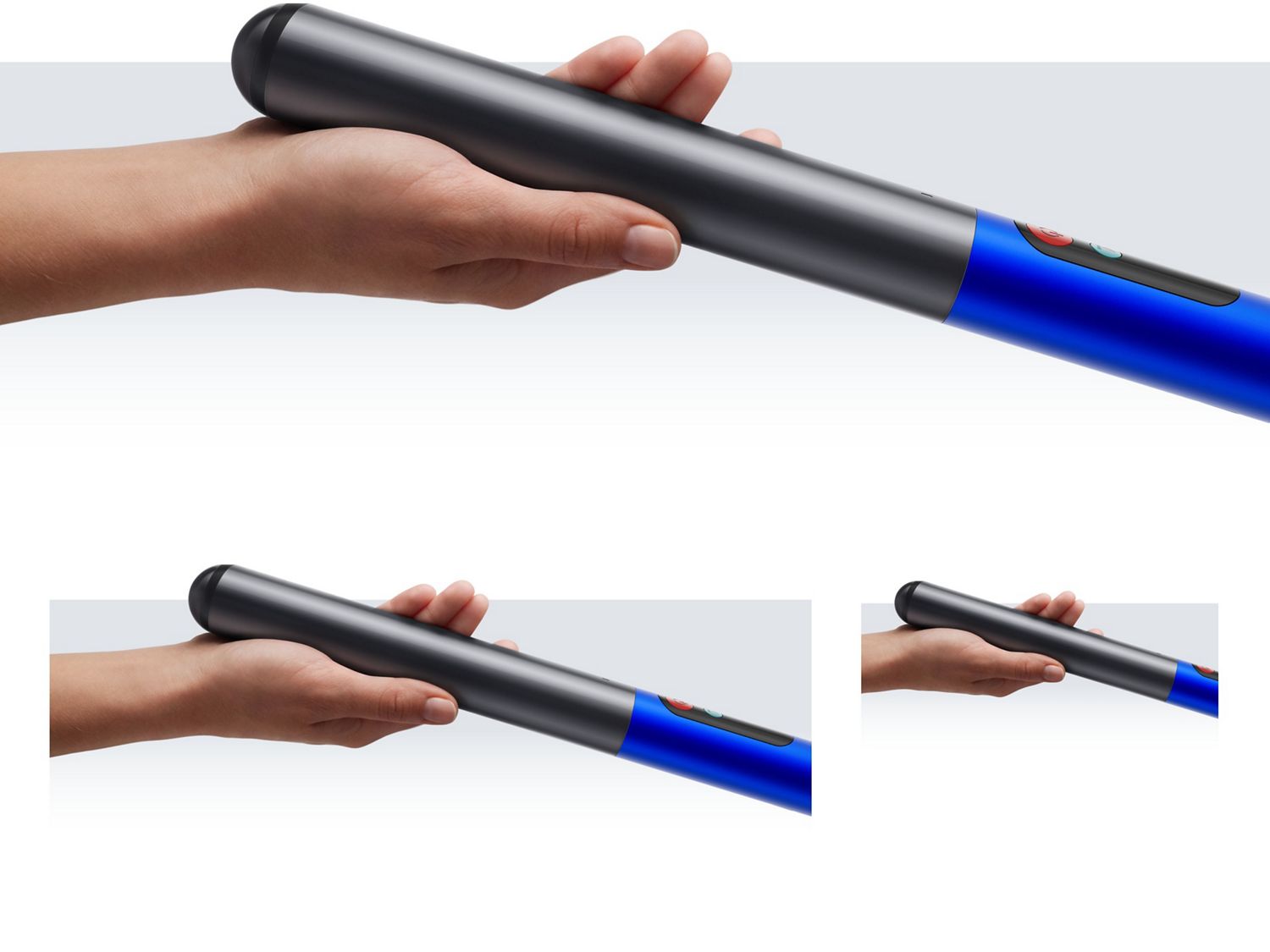 Dyson W1 PencilWash cleaner handle held in a hand.