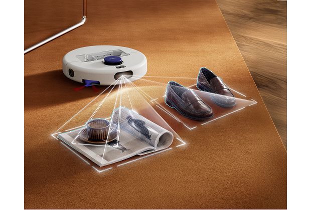 A Dyson R1 Nurovi or R2 Nurovi robot vacuum cleaner detects and avoids obstacles in a home.