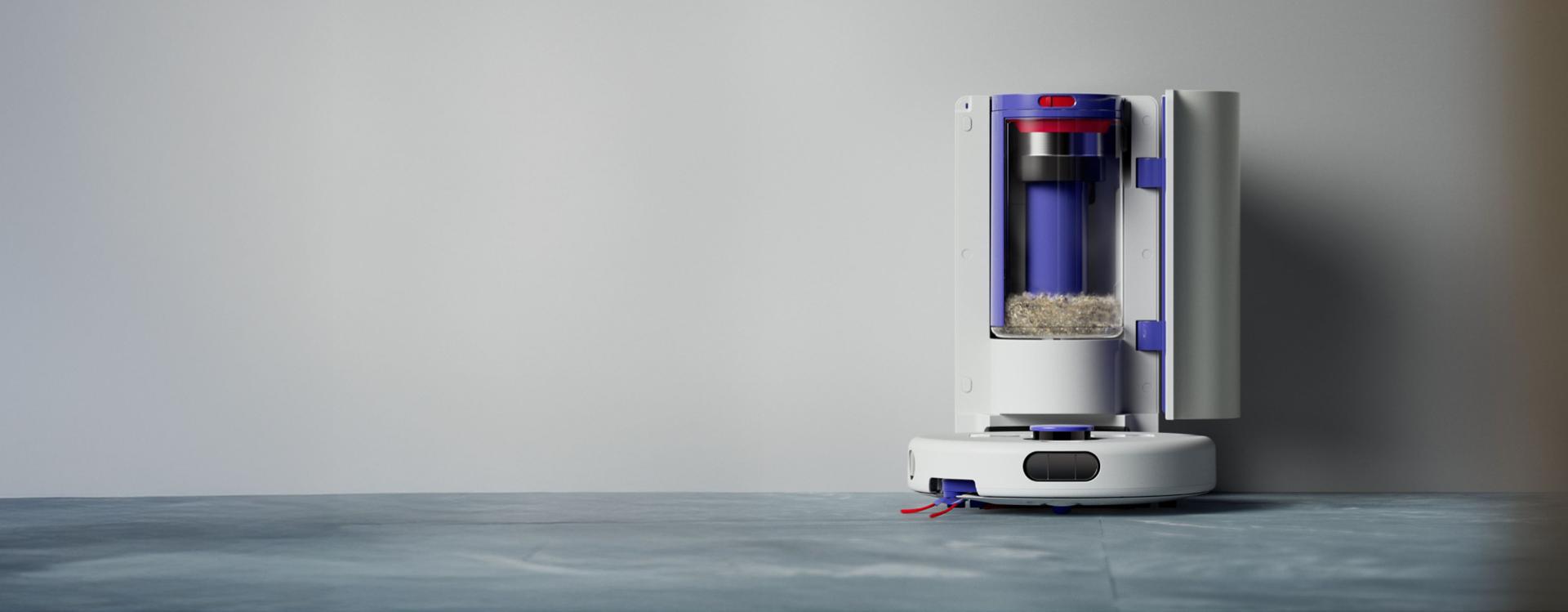 Dyson R1 Nurovi Dry robot vacuum cleaner self-emptying in its dock.
