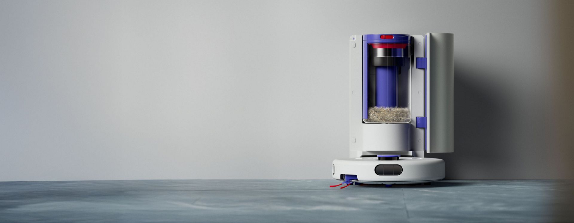 Dyson R1 Nurovi Dry robot vacuum cleaner self-emptying in its dock.
