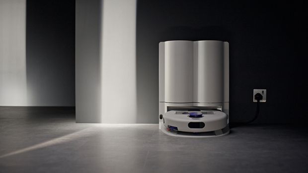 Dyson R2 Nurovi Wash+Dry robot vacuum charges in its dock.