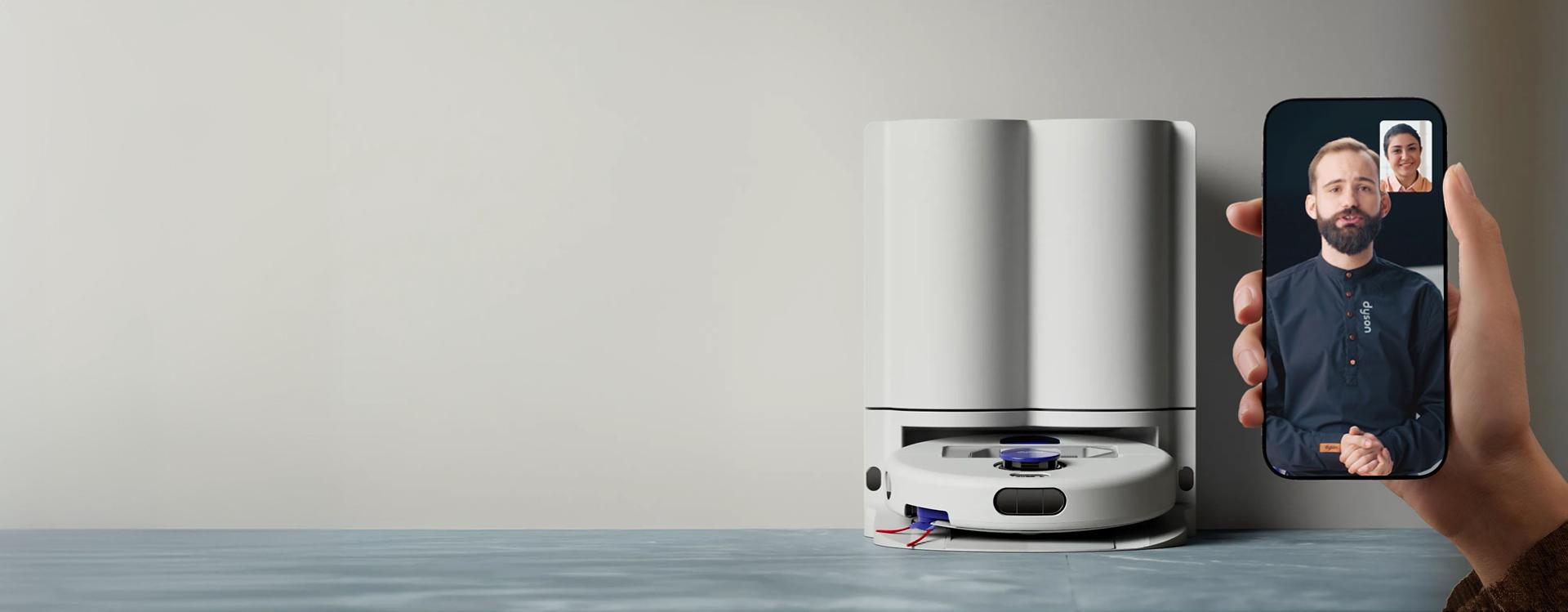 A Dyson robot expert guides a new robot owner through setting up their machine.