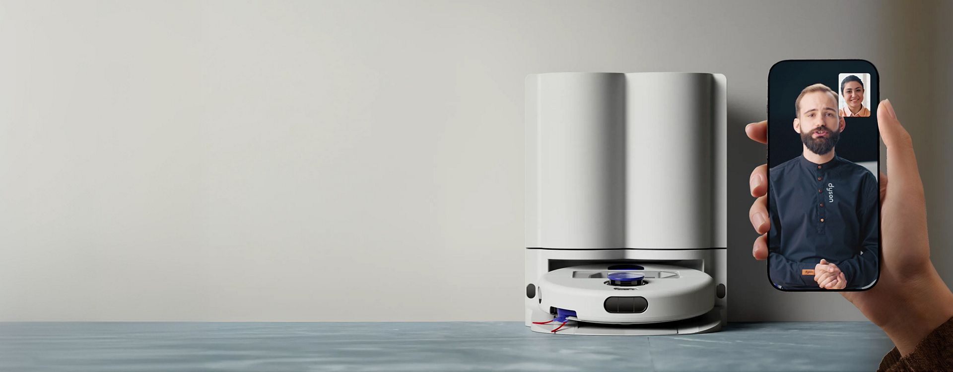 A Dyson robot expert guides a new robot owner through setting up their machine.