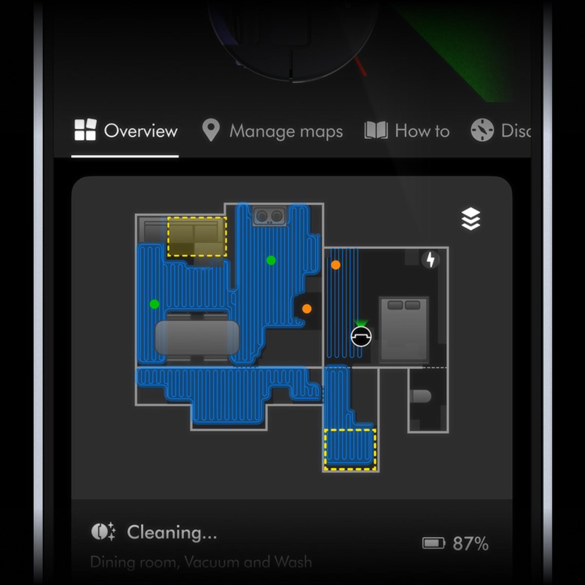 A floor plan of a home on the MyDyson app showing various rooms and the location of the Spot+Scrub Ai robot vacuum.