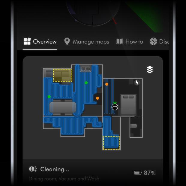 A floor plan of a home on the MyDyson app showing various rooms and the location of the Spot+Scrub Ai robot vacuum.