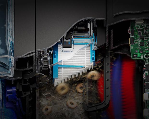 The brush bar of the Dyson Spot+Scrub Ai robot vacuum cleans a carpet.