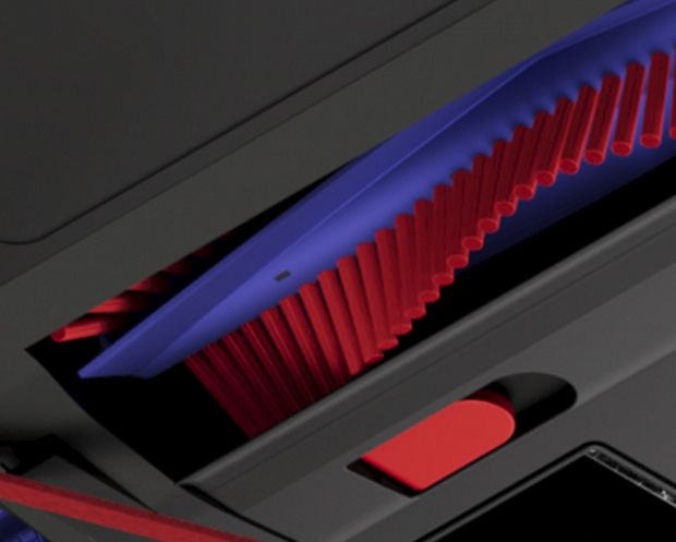 Close-up of the anti-tangle brush bar on the Dyson Spot+Scrub Ai robot vacuum.