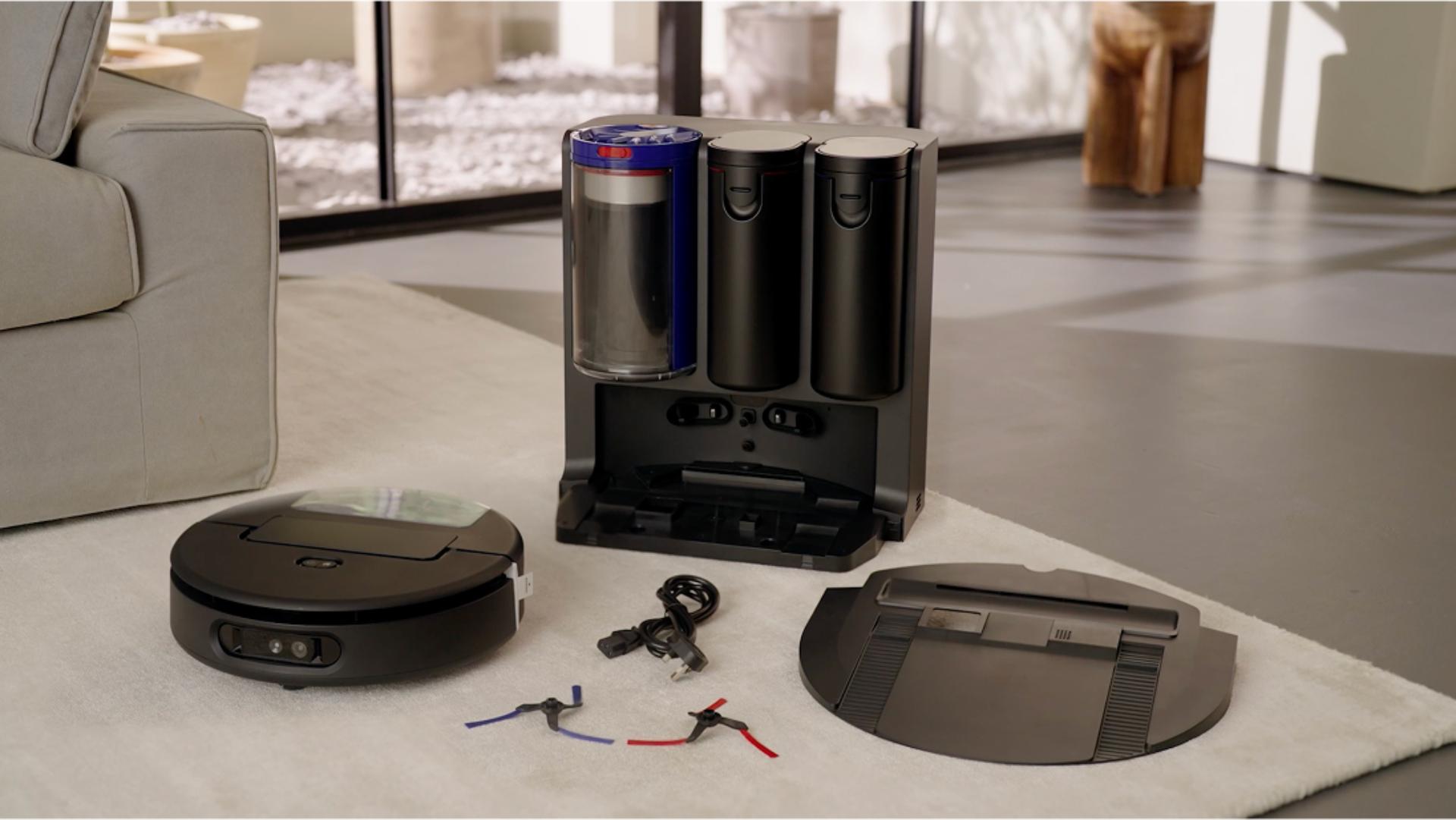The Dyson Spot+Scrub Ai robot vacuum and docking station, unboxed and ready for assembly.