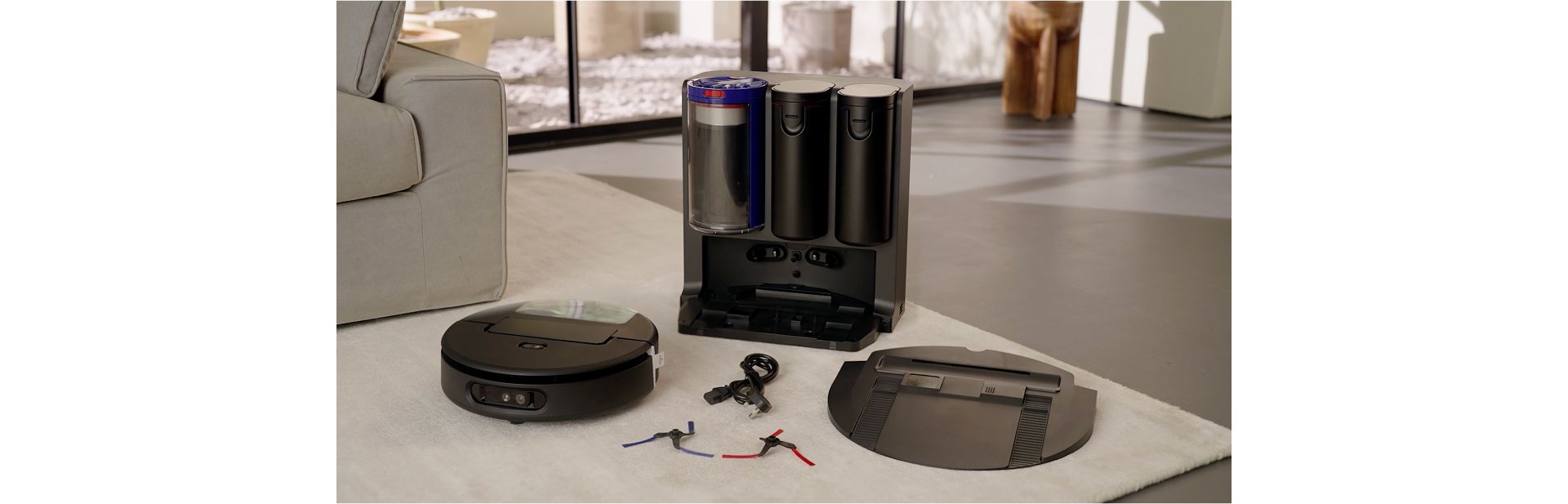 The Dyson Spot+Scrub Ai robot vacuum and docking station, unboxed and ready for assembly.