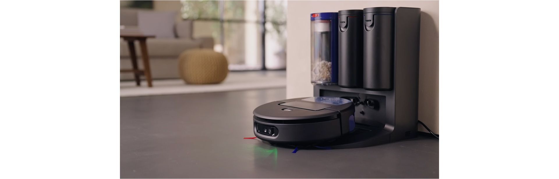 The Dyson Spot+Scrub Ai robot vacuum returns to its docking station.