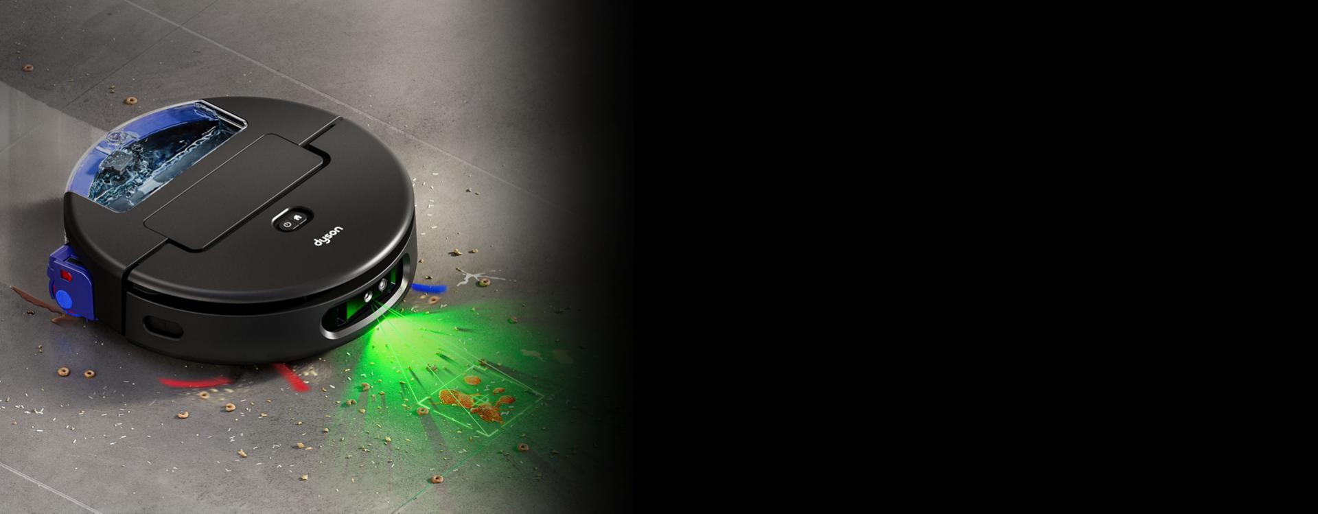 المكنسة الروبوت Dyson Spot+Scrub Ai للتنظيف الرطب والجاف تصدر ضوءًا أخضر للمساعدة في اكتشاف الانسكابات والمخلفات.