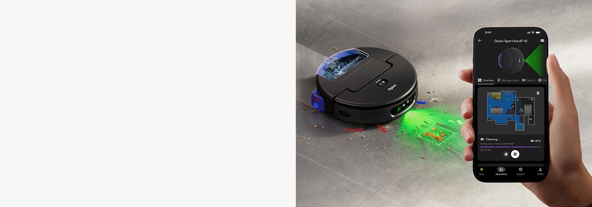 The Dyson Spot+Scrub Ai robot vacuum detects stains using Ai intelligence and a phone shows the machine on the MyDyson app.