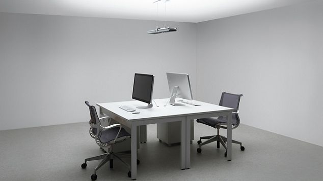 Pyramid of light over boardroom table