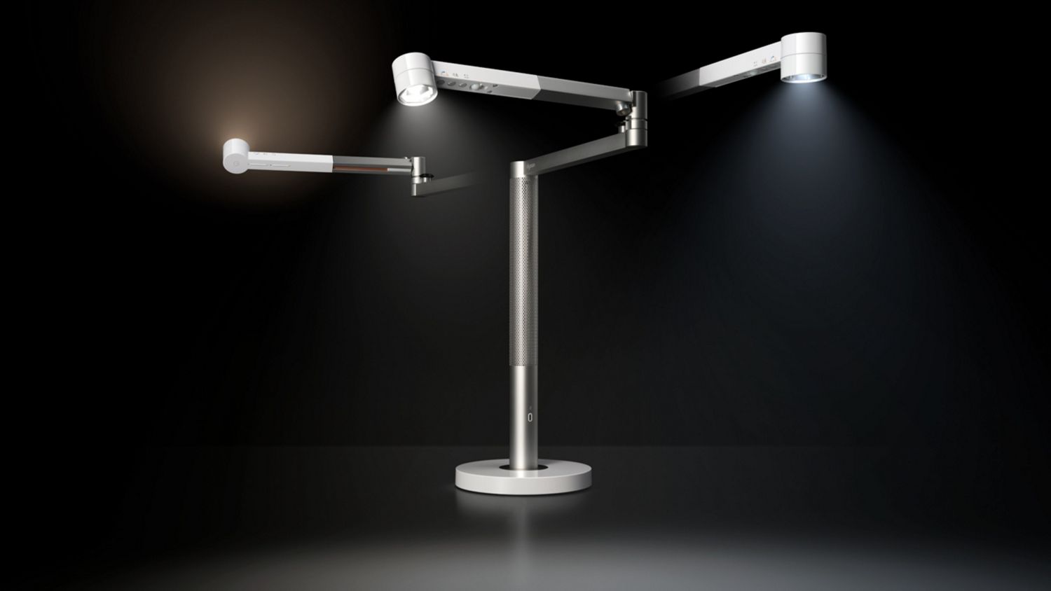 Dyson Solarcycle Morph desk light displayed at varying angles.