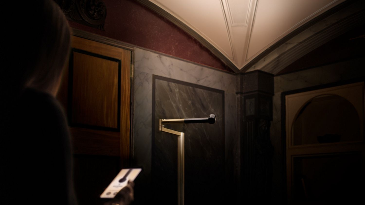  Dyson Solarcycle Morph floor light angled into a corner to gently light the room.