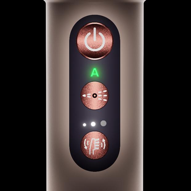 The power and control buttons on the Dyson CameraJet toothbrush.