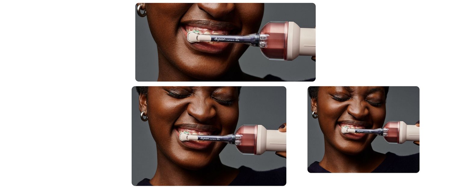Close-up of a person brushing their teeth with an electric toothbrush, showing the brush head against the teeth and lips.