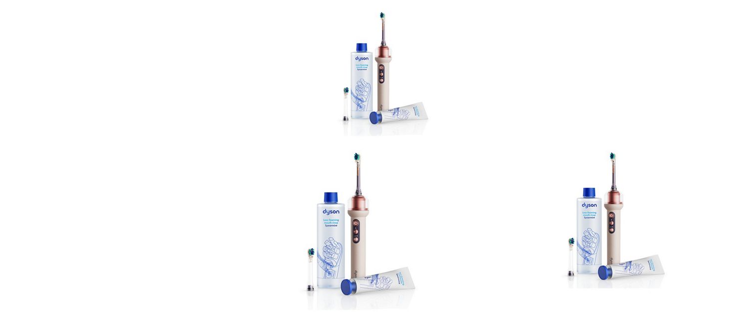 Electric toothbrush displayed alongside retail packaging and accessories on a white background.