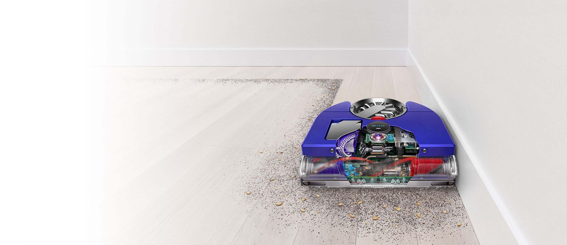Dyson 360 Vis Nav™ robotstøvsugeren rengjør i hjørnet av et rom.