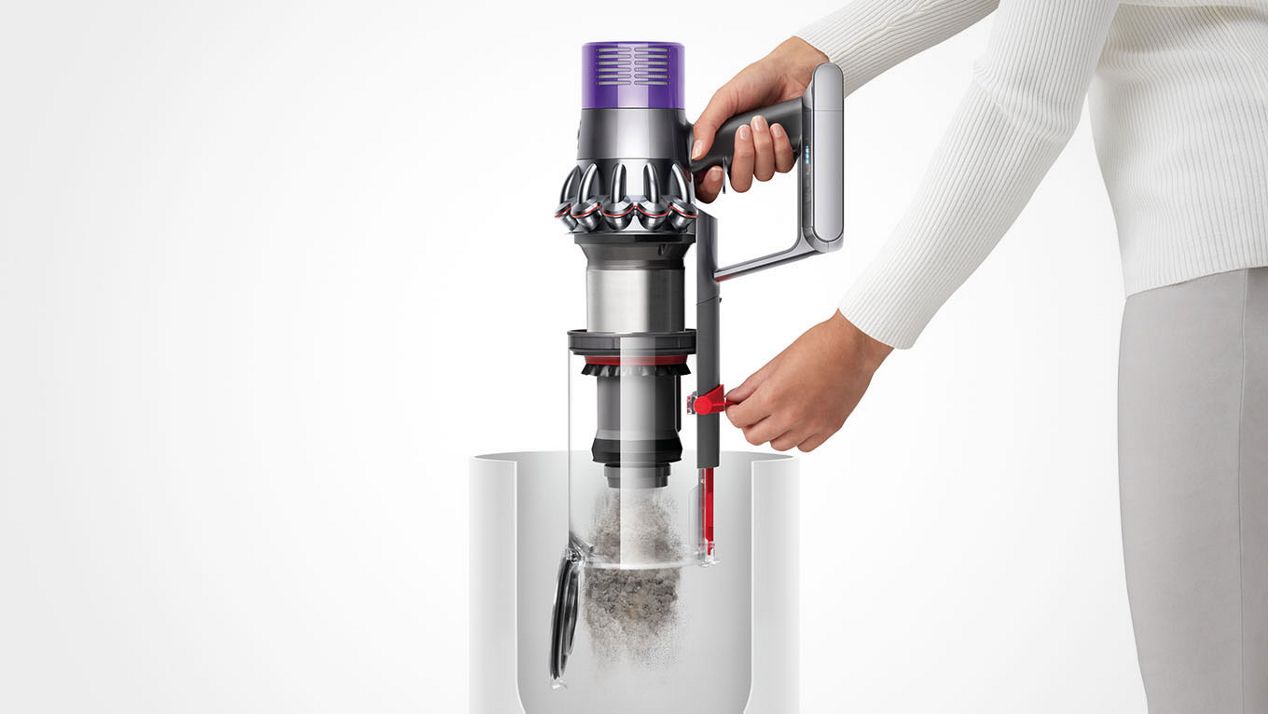 Vacuum bin being emptied